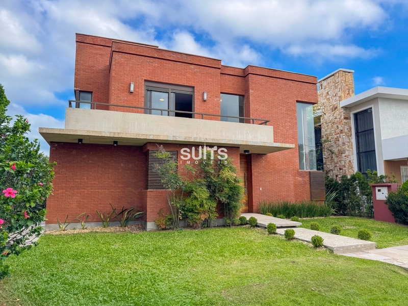 Excelente sobrado à venda no condomínio Ventura em Xangri-lá: 1ª foto da galeria de imagens do imóvel