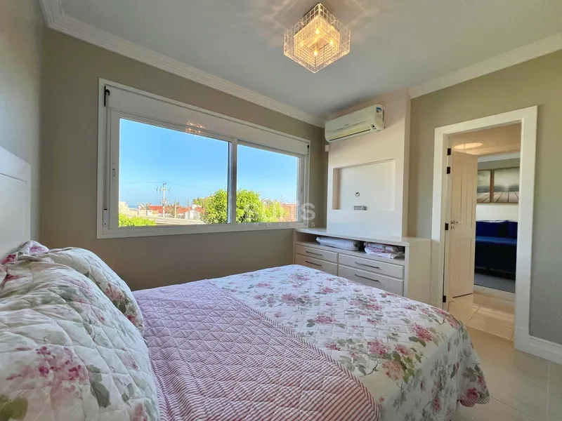 Incrível sobrado junto ao mar na praia de Atlântida: 58ª foto da galeria de imagens do imóvel