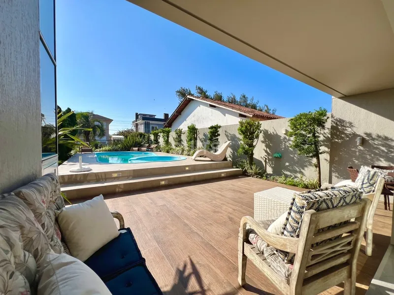 Incrível sobrado junto ao mar na praia de Atlântida: 36ª foto da galeria de imagens do imóvel