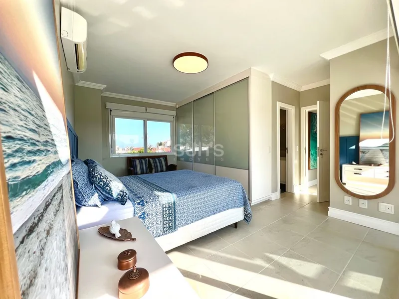 Incrível sobrado junto ao mar na praia de Atlântida: 63ª foto da galeria de imagens do imóvel