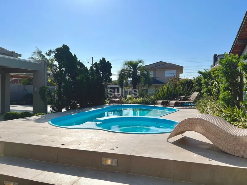 Incrível sobrado junto ao mar na praia de Atlântida: 10ª foto da galeria de imagens do imóvel