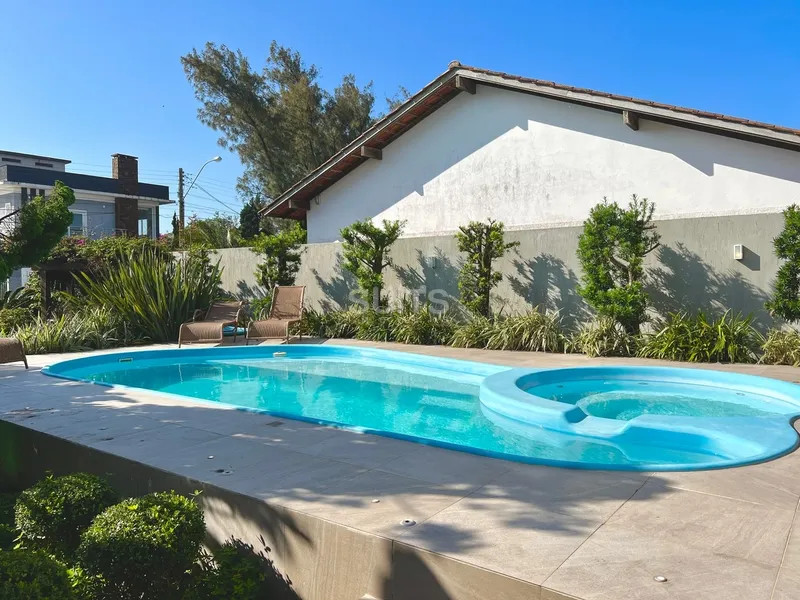 Incrível sobrado junto ao mar na praia de Atlântida: 8ª foto da galeria de imagens do imóvel