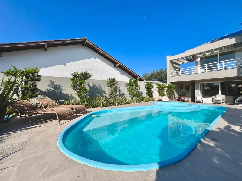 Incrível sobrado junto ao mar na praia de Atlântida: 13ª foto da galeria de imagens do imóvel