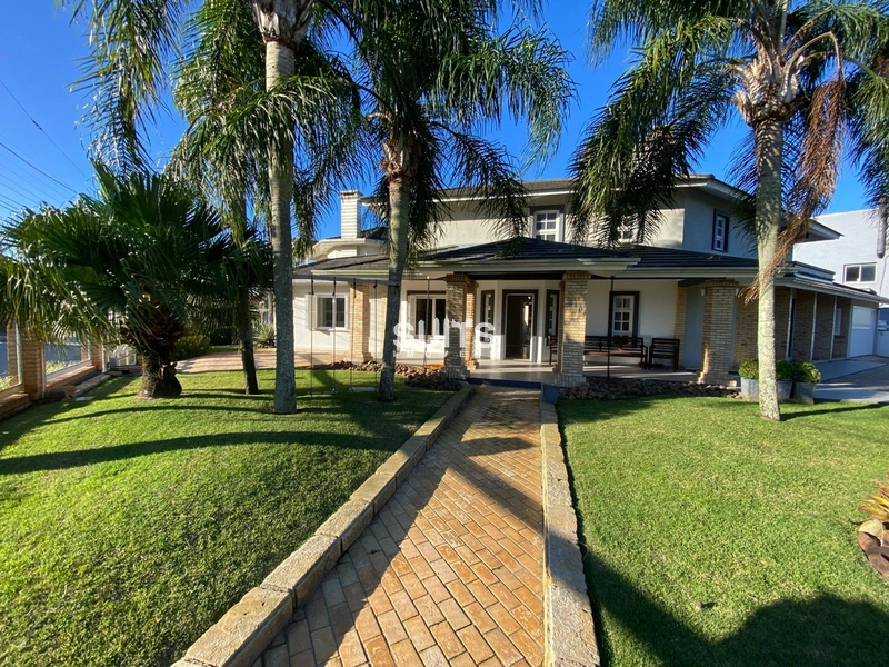 Excelente sobrado à venda em Atlântida: 1ª foto da galeria de imagens do imóvel