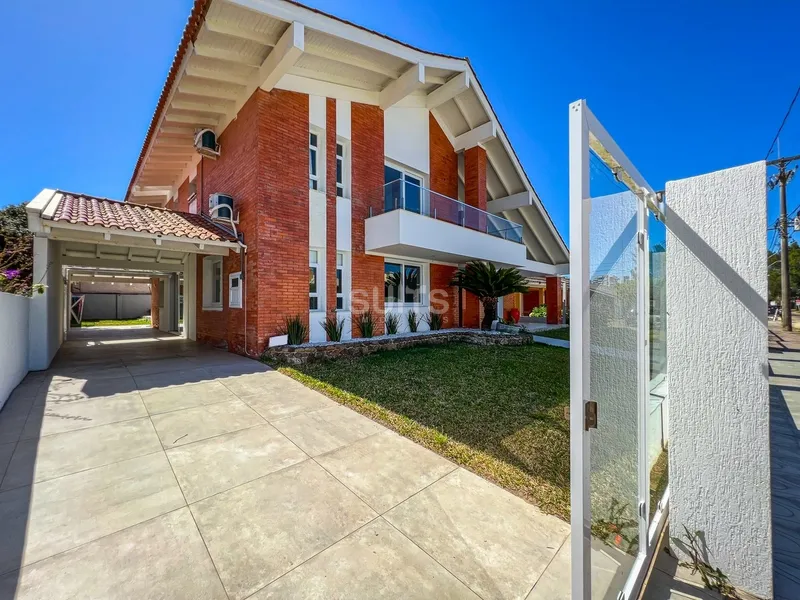 Sobrado uma quadra do mar em Atlântida: 1ª foto da galeria de imagens do imóvel