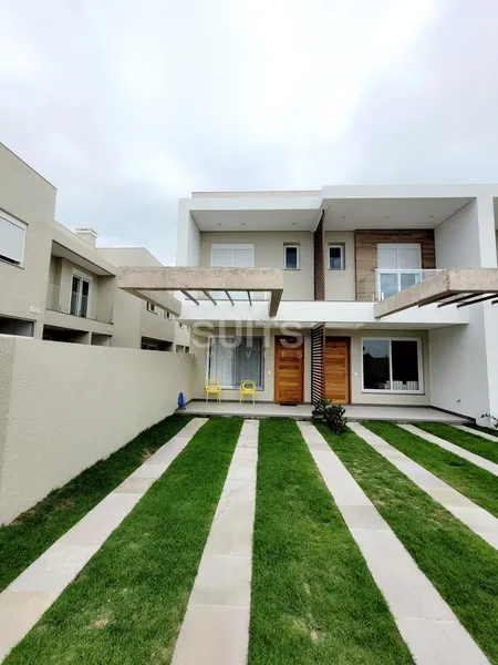 Sobrado no condomínio Murano em Capão da Canoa.: 2ª foto da galeria de imagens do imóvel