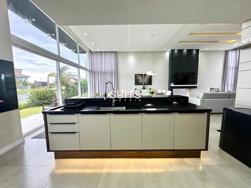 Lindo imóvel beira lago no condomínio Riviera: 12ª foto da galeria de imagens do imóvel