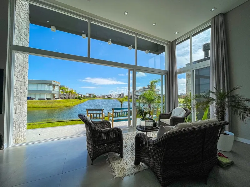 Lindo imóvel beira lago no condomínio Riviera: 7ª foto da galeria de imagens do imóvel