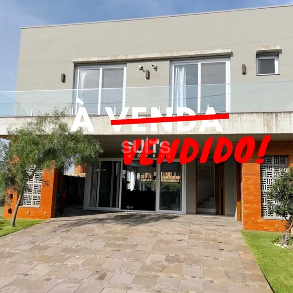 Ótimo sobrado com estilo rústico à venda no condomínio Blue: 1ª foto da galeria de imagens do imóvel