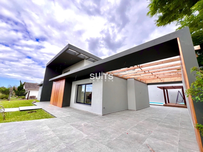 Incrível casa na praia de Atlântida em Xangri-Lá: 1ª foto da galeria de imagens do imóvel