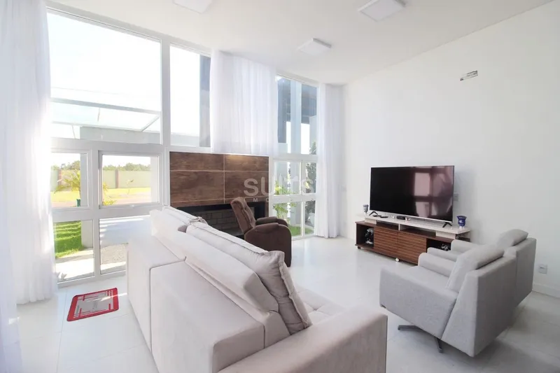 Linda casa com fundos para a área verde no condomínio Riviera: 4ª foto da galeria de imagens do imóvel