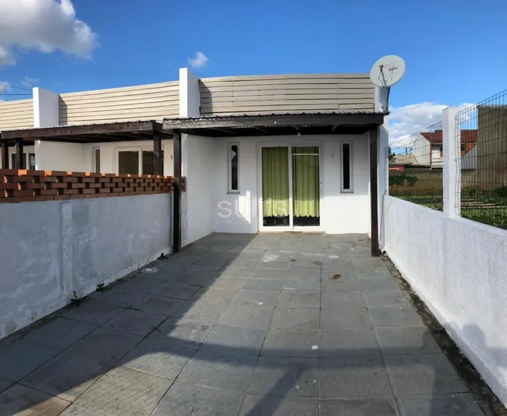 Ótima Casa Geminada no Centro de Xangri-Lá: 1ª foto da galeria de imagens do imóvel