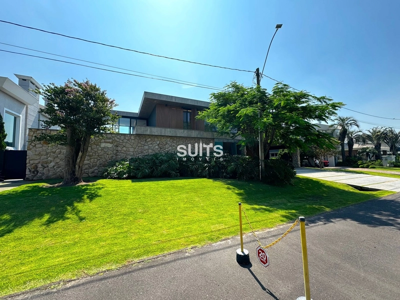 Mansão com 02 terrenos na beira do lago no cond. Bosques de Atlântida: 1ª foto da galeria de imagens do imóvel