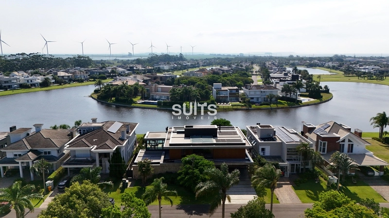 Mansão com 02 terrenos na beira do lago no cond. Bosques de Atlântida: 4ª foto da galeria de imagens do imóvel