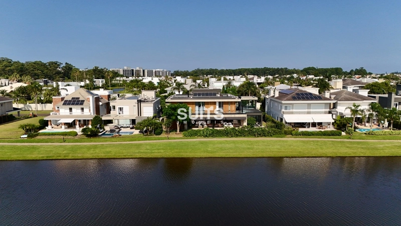 Mansão com 02 terrenos na beira do lago no cond. Bosques de Atlântida: 5ª foto da galeria de imagens do imóvel