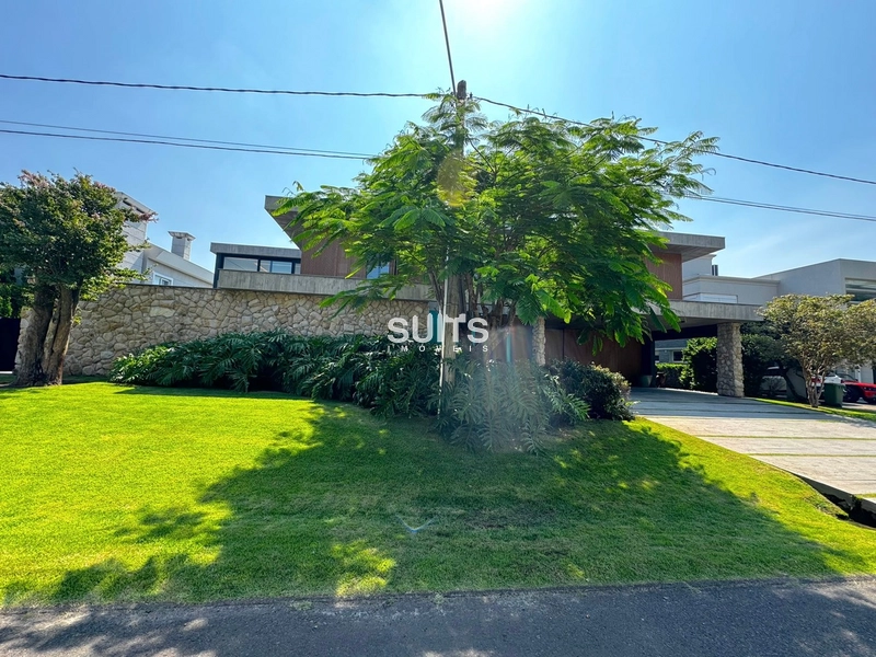 Mansão com 02 terrenos na beira do lago no cond. Bosques de Atlântida: 2ª foto da galeria de imagens do imóvel