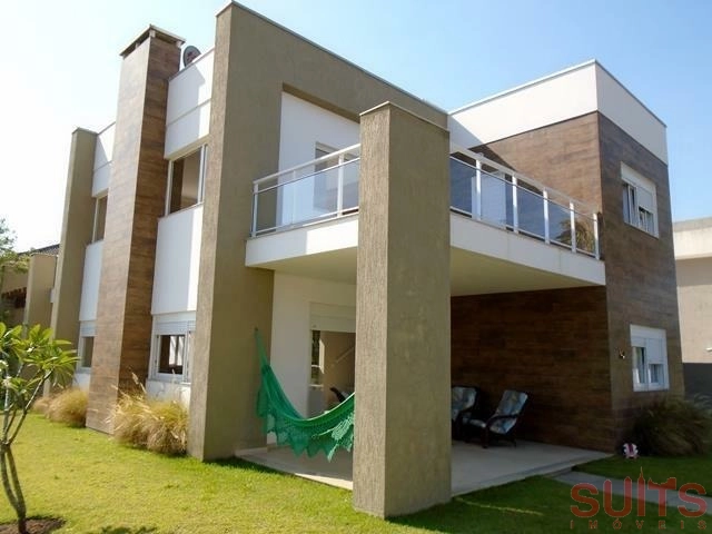 Sobrado em excelente localização próximo ao mar na praia de Atlântida: 1ª foto da galeria de imagens do imóvel