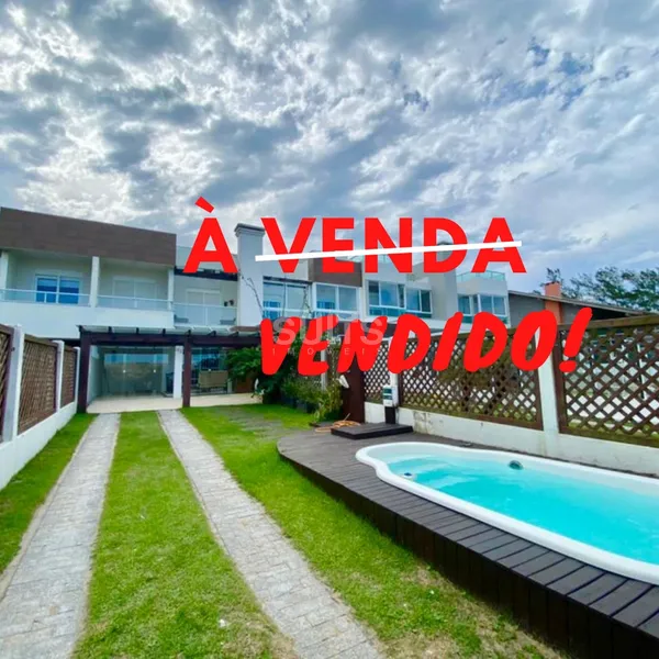 Excelente sobrado duplex à venda no Centro de Xangri-Lá: 1ª foto da galeria de imagens do imóvel