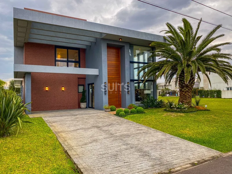 Incrível sobrado mobiliado e decorado à venda no condomínio Enseada: 3ª foto da galeria de imagens do imóvel