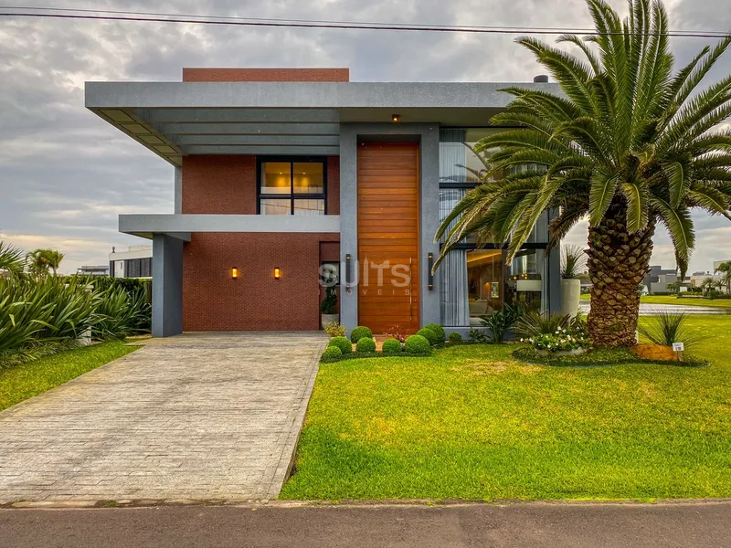 Incrível sobrado mobiliado e decorado à venda no condomínio Enseada: 2ª foto da galeria de imagens do imóvel