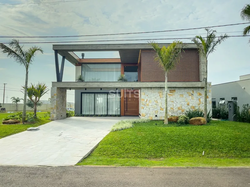 Excelente mansão com fundos para uma área verde no cond. Enseada Lagos: 1ª foto da galeria de imagens do imóvel