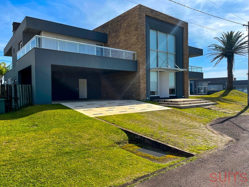 Ótimo sobrado com 02 terrenos à venda no condomínio Riviera: 1ª foto da galeria de imagens do imóvel