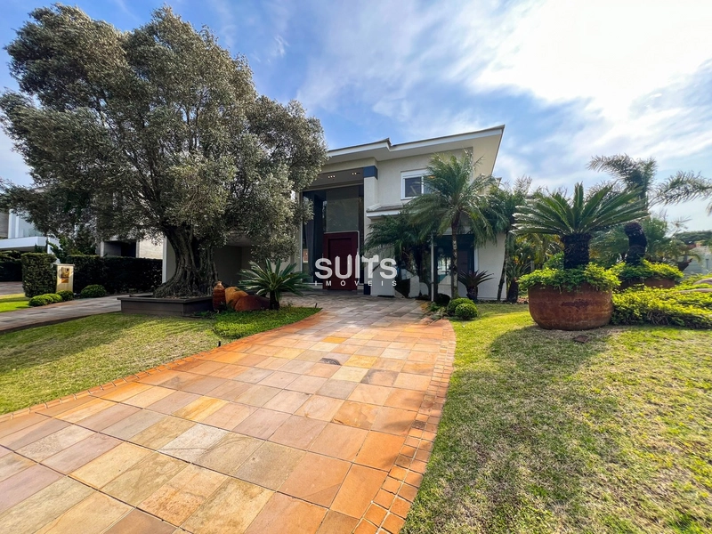 Excelente Sobrado no Condomínio Bosques de Atlântida: 2ª foto da galeria de imagens do imóvel