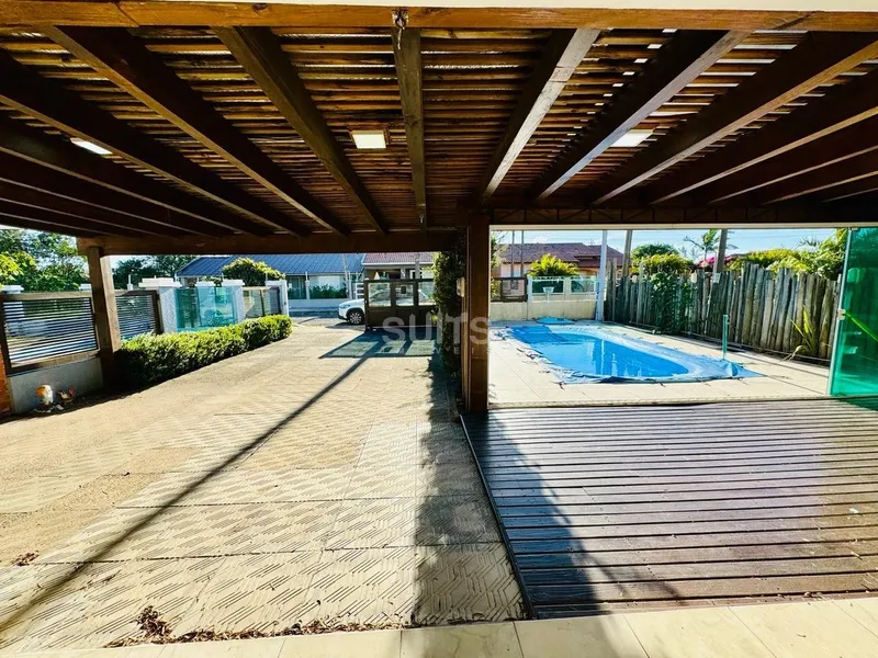 Sobrado com piscina mobiliado na praia de Xangri-Lá: 3ª foto da galeria de imagens do imóvel