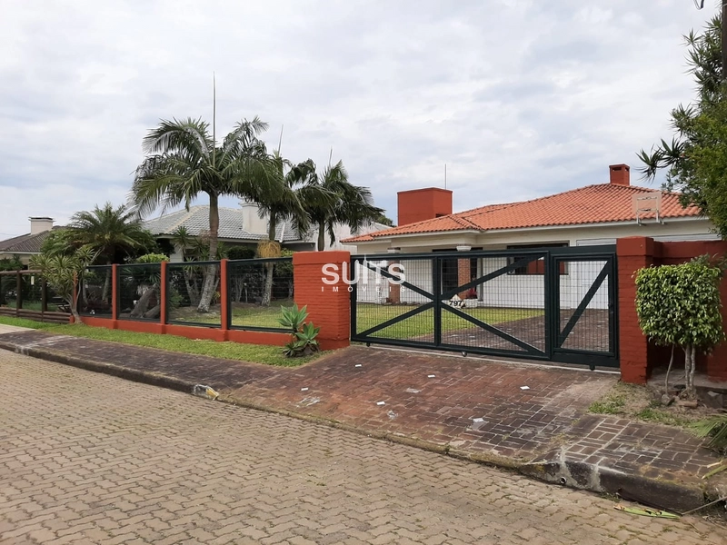 Belíssima casa em excelente localização na praia de Atlântida: 3ª foto da galeria de imagens do imóvel