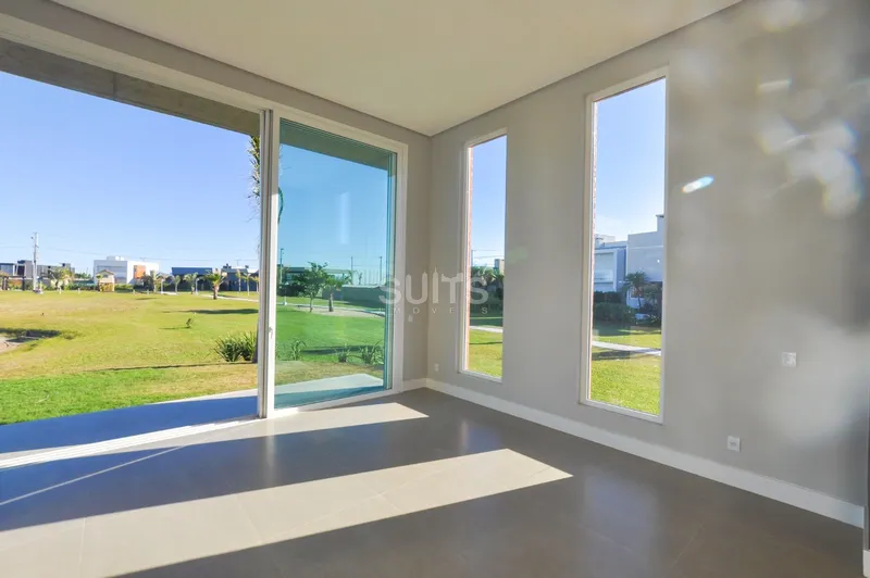 Excelente casa com lote diferenciado no condomínio Riviera: 8ª foto da galeria de imagens do imóvel