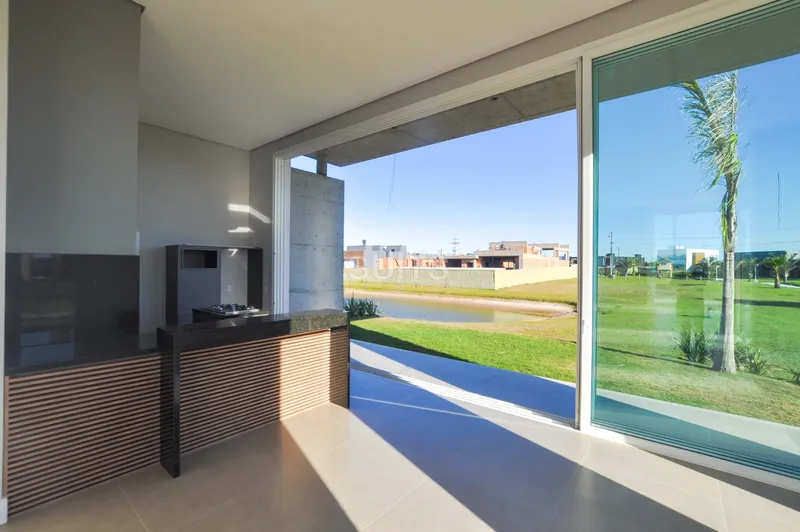 Excelente casa com lote diferenciado no condomínio Riviera: 7ª foto da galeria de imagens do imóvel