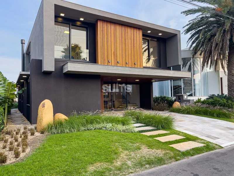 Mansão beira lago no condomínio Malibu!: 2ª foto da galeria de imagens do imóvel