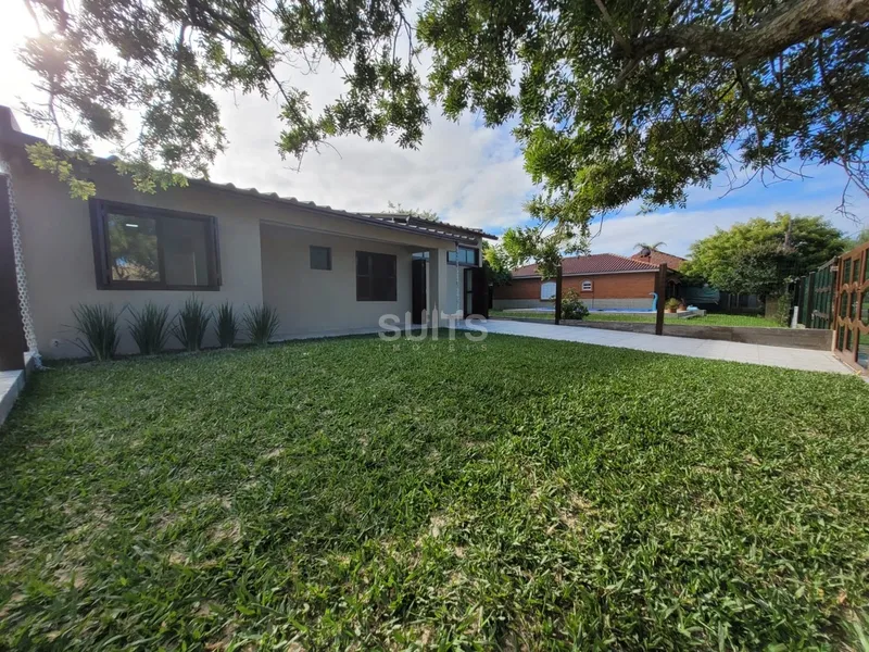 Excelente casa em Atlântida Sul: 3ª foto da galeria de imagens do imóvel