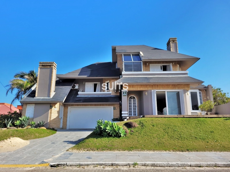 Excelente sobrado na beira mar da praia de Atlântida: 1ª foto da galeria de imagens do imóvel