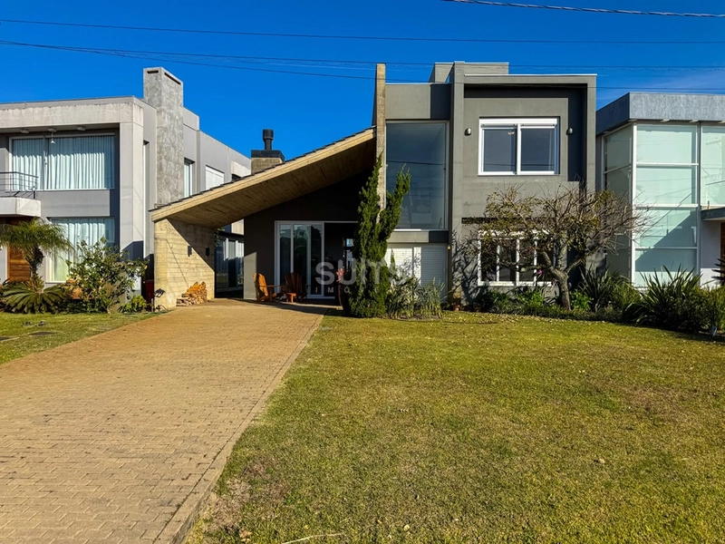 Excelente casa térrea à venda no condomínio Riviera: 1ª foto da galeria de imagens do imóvel