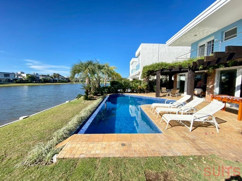 Magnifico sobrado beira lago no Condomínio Bosques de Atlântida: 34ª foto da galeria de imagens do imóvel