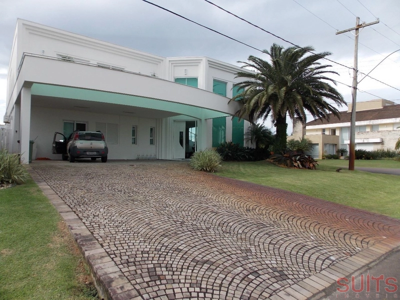 Incrível mansão no condomínio Bosques de Atlântida: 1ª foto da galeria de imagens do imóvel