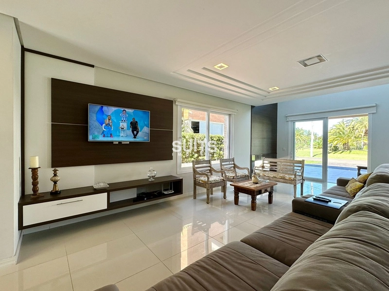 Excelente sobrado no condomínio Villaggio de Atlântida: 3ª foto da galeria de imagens do imóvel