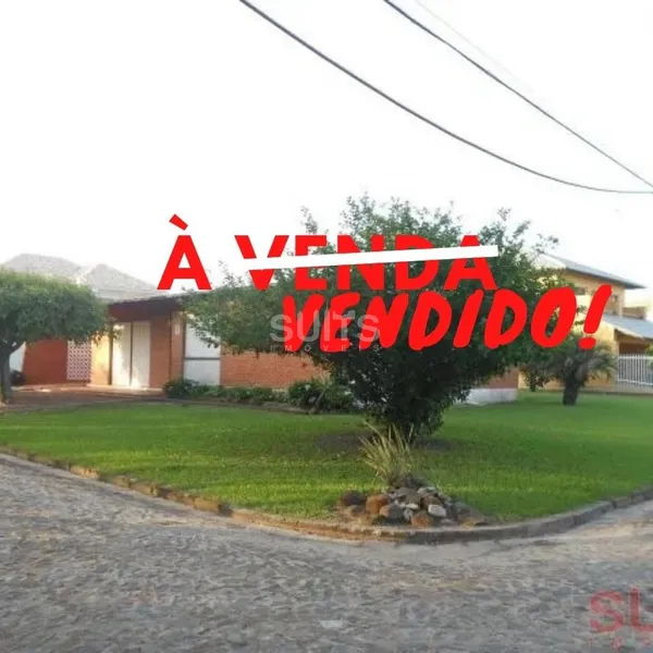 Casa com 02 terrenos  no Centro da praia de Xangri-Lá: 1ª foto da galeria de imagens do imóvel