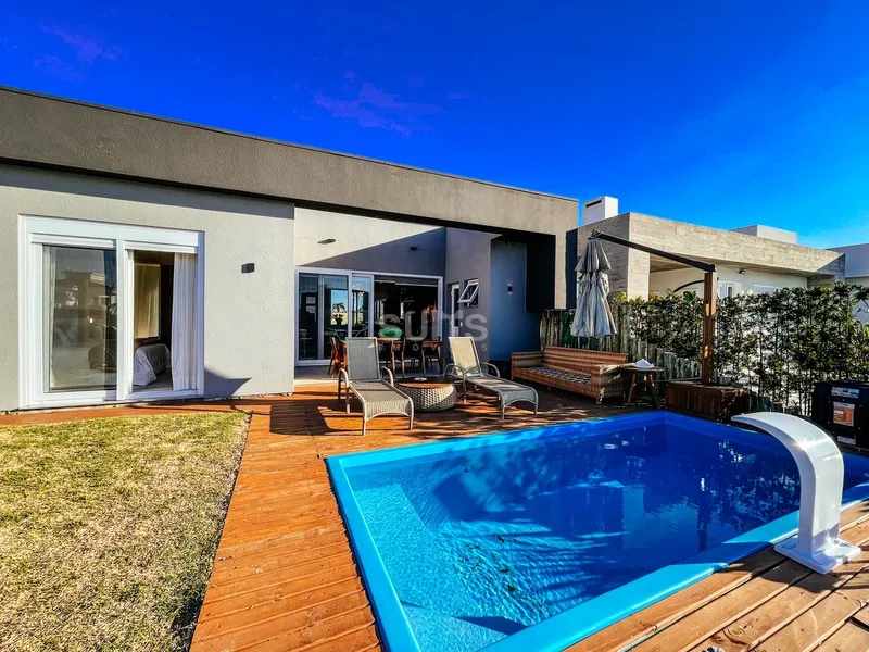 Incrível casa beira lago no condomínio Riviera: 33ª foto da galeria de imagens do imóvel