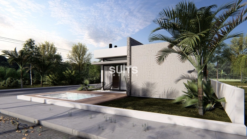 Belíssima casa á poucos metros do mar em Atlântida Sul: 3ª foto da galeria de imagens do imóvel