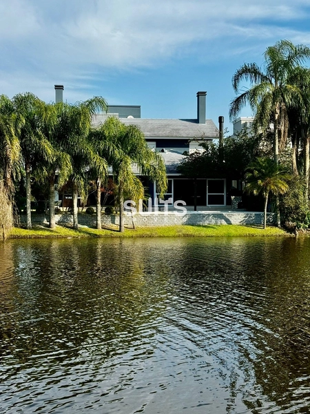 Magnífico sobrado beira-lago no Condomínio Atlântida Ilhas Park: 28ª foto da galeria de imagens do imóvel