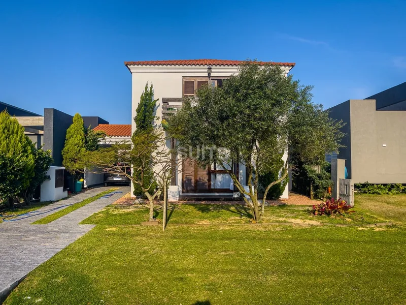 Ótimo sobrado à venda no condomínio Riviera: 1ª foto da galeria de imagens do imóvel