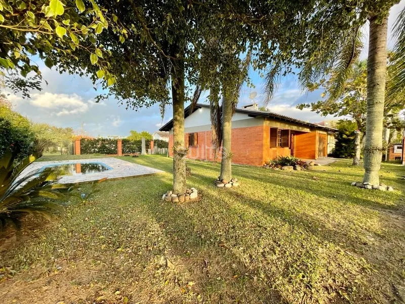 Excelente casa com piscina na praia de Atlântida em Xangri-Lá: 2ª foto da galeria de imagens do imóvel