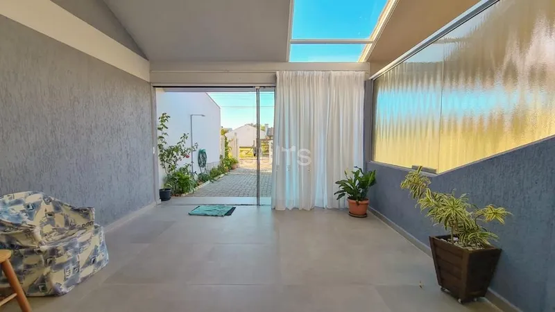 Excelente duplex próximo do mar no centro de Xangri-Lá: 3ª foto da galeria de imagens do imóvel