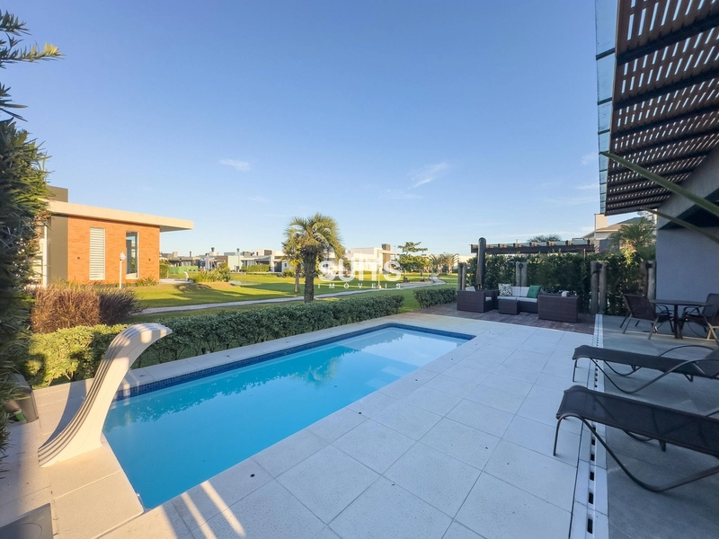 Linda casa com fundos para área verde no condomínio Riviera: 14ª foto da galeria de imagens do imóvel