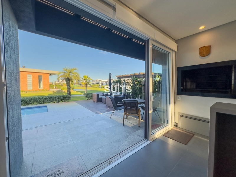 Linda casa com fundos para área verde no condomínio Riviera: 12ª foto da galeria de imagens do imóvel