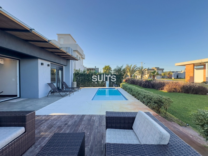 Linda casa com fundos para área verde no condomínio Riviera: 15ª foto da galeria de imagens do imóvel