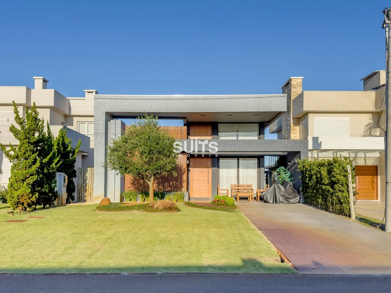 Linda casa com fundos para área verde no condomínio Riviera: 2ª foto da galeria de imagens do imóvel