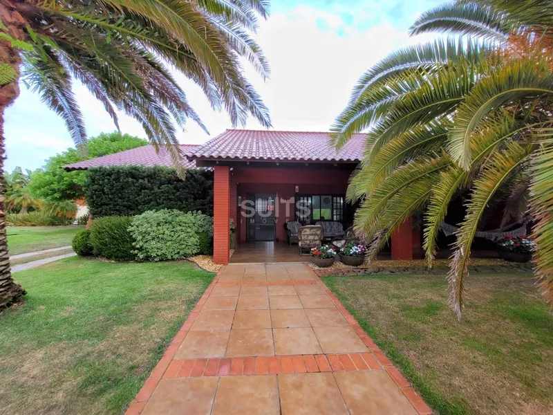 Excelente casa com 2 lotes lotes em Atlântida: 3ª foto da galeria de imagens do imóvel